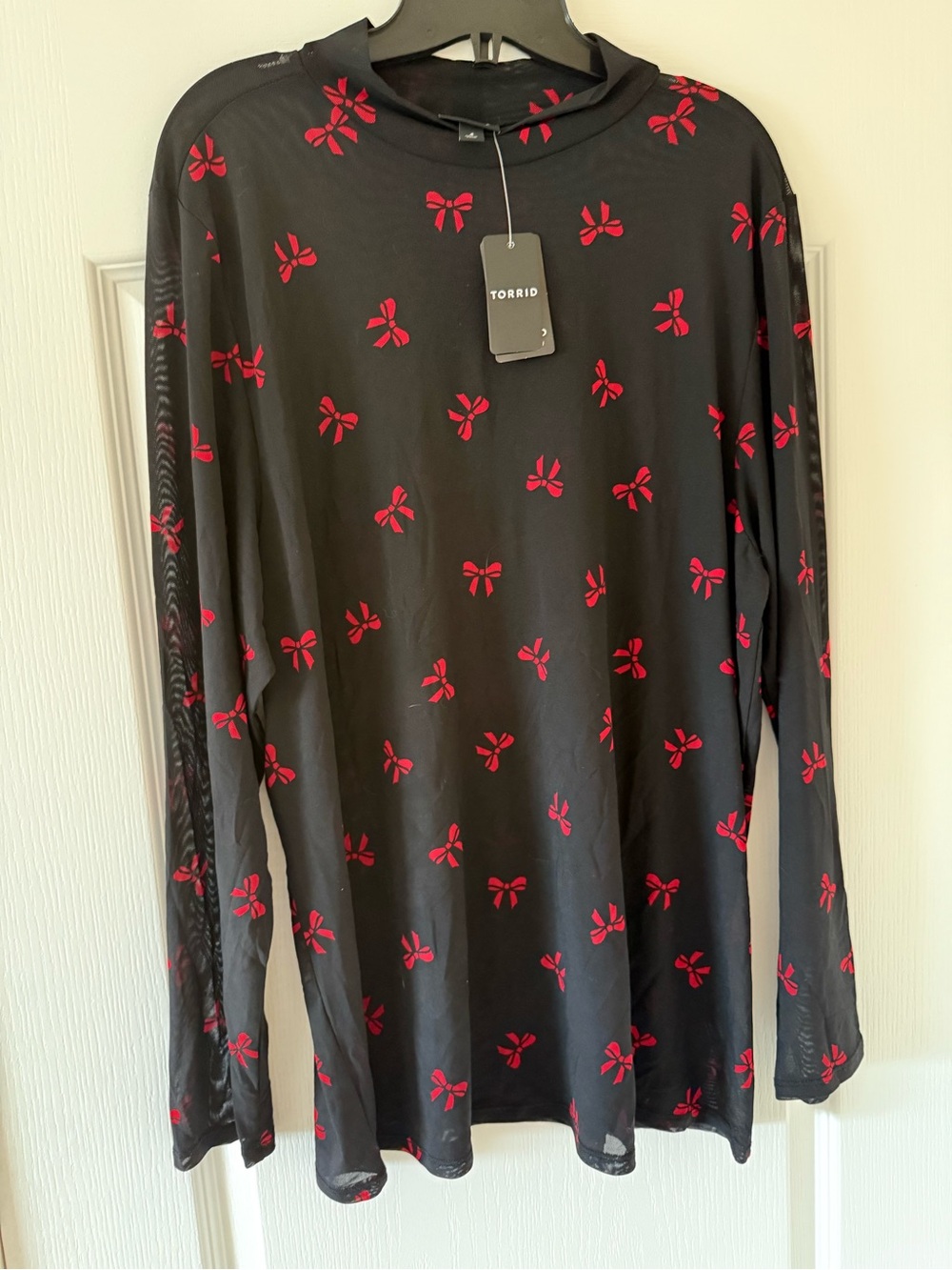 Torrid Black Mesh Long Sleeve Top with Red Bow Motif